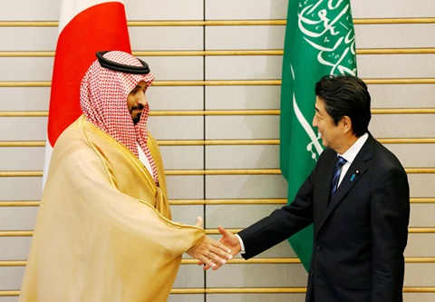 Prince Muhammad meets with Japan’s Prime Minister Shinzo Abe at the latter’s official residence in Tokyo, Thursday. — Reuters